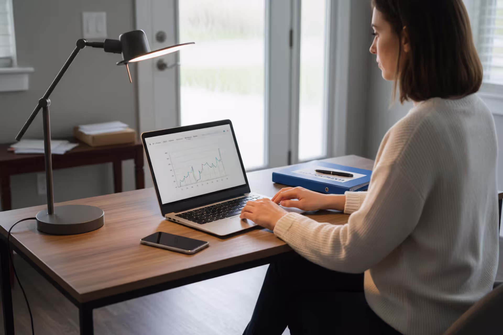 LLC owner working from a home office with legal documents